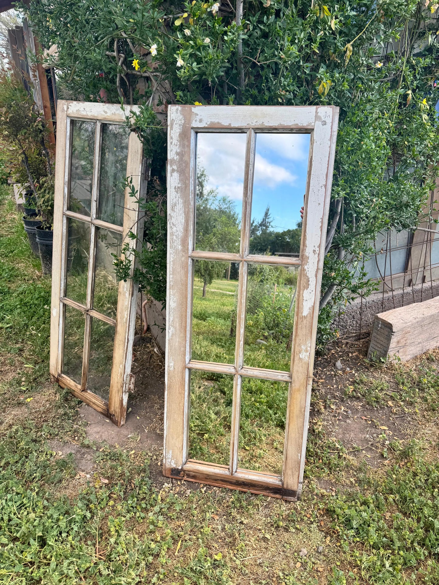 Espejo_de_ventana_y_ventana_atras