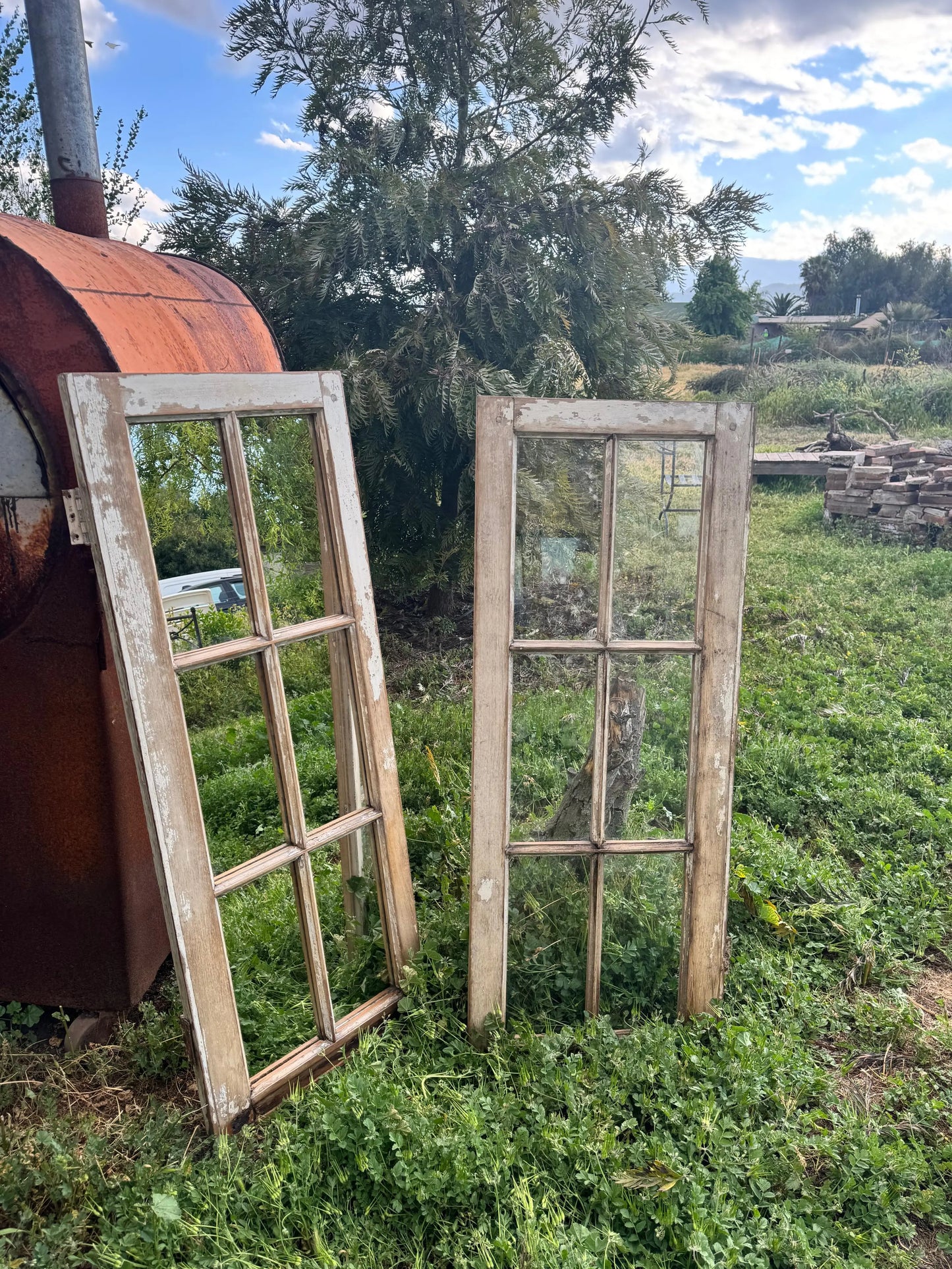 Espejo_de_ventana_y_ventana_vertical