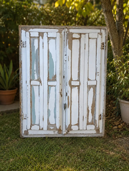 Ventana_con_postigo_107x137