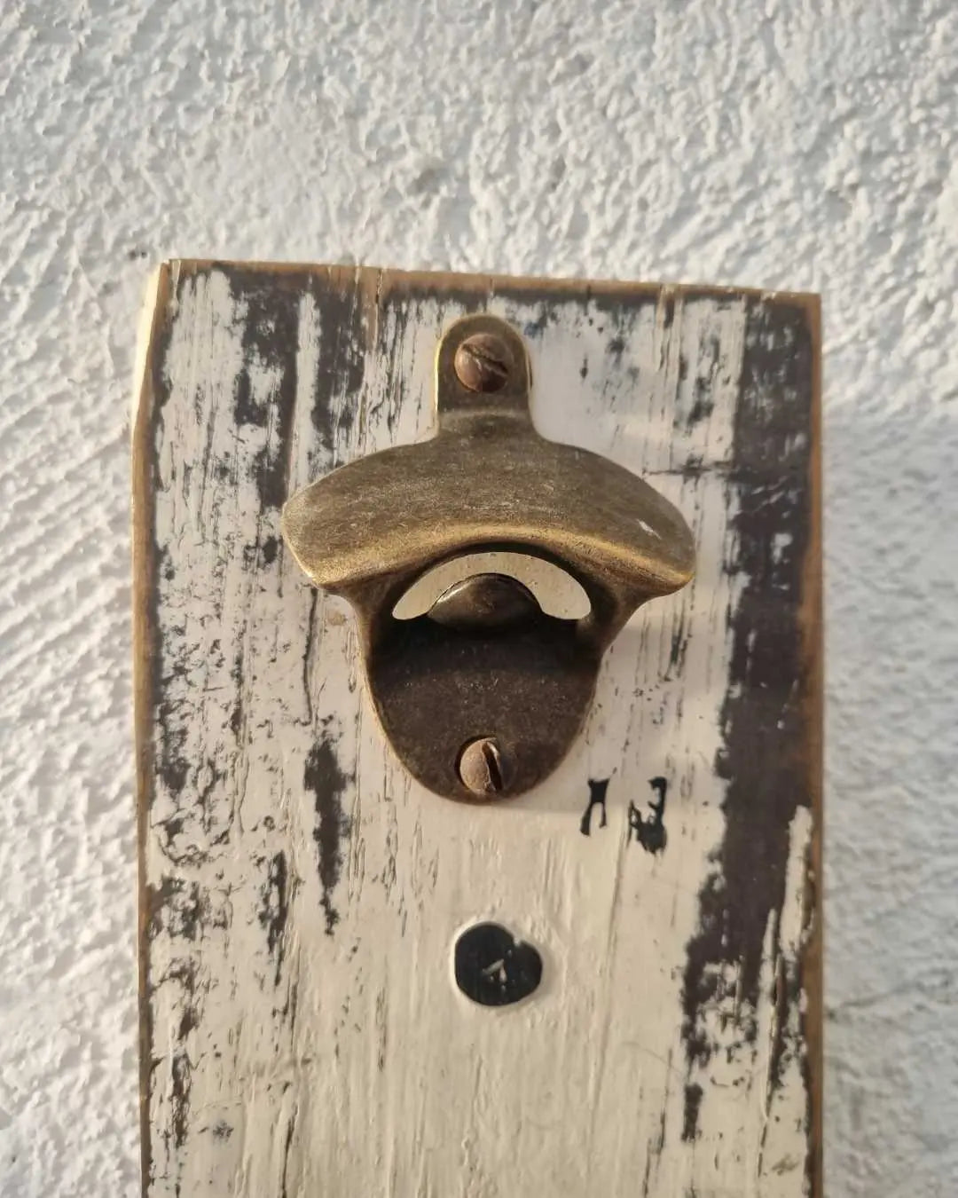 Destapador de botellas de muro