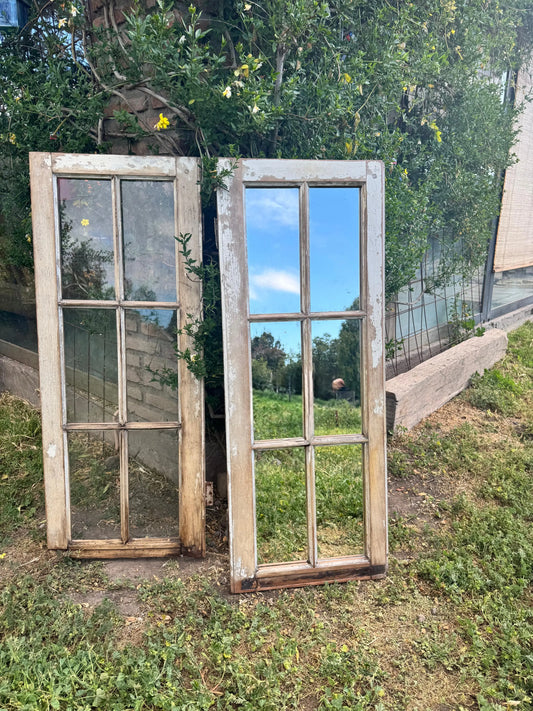 Espejo_de_ventana_y_vantana_al_lado