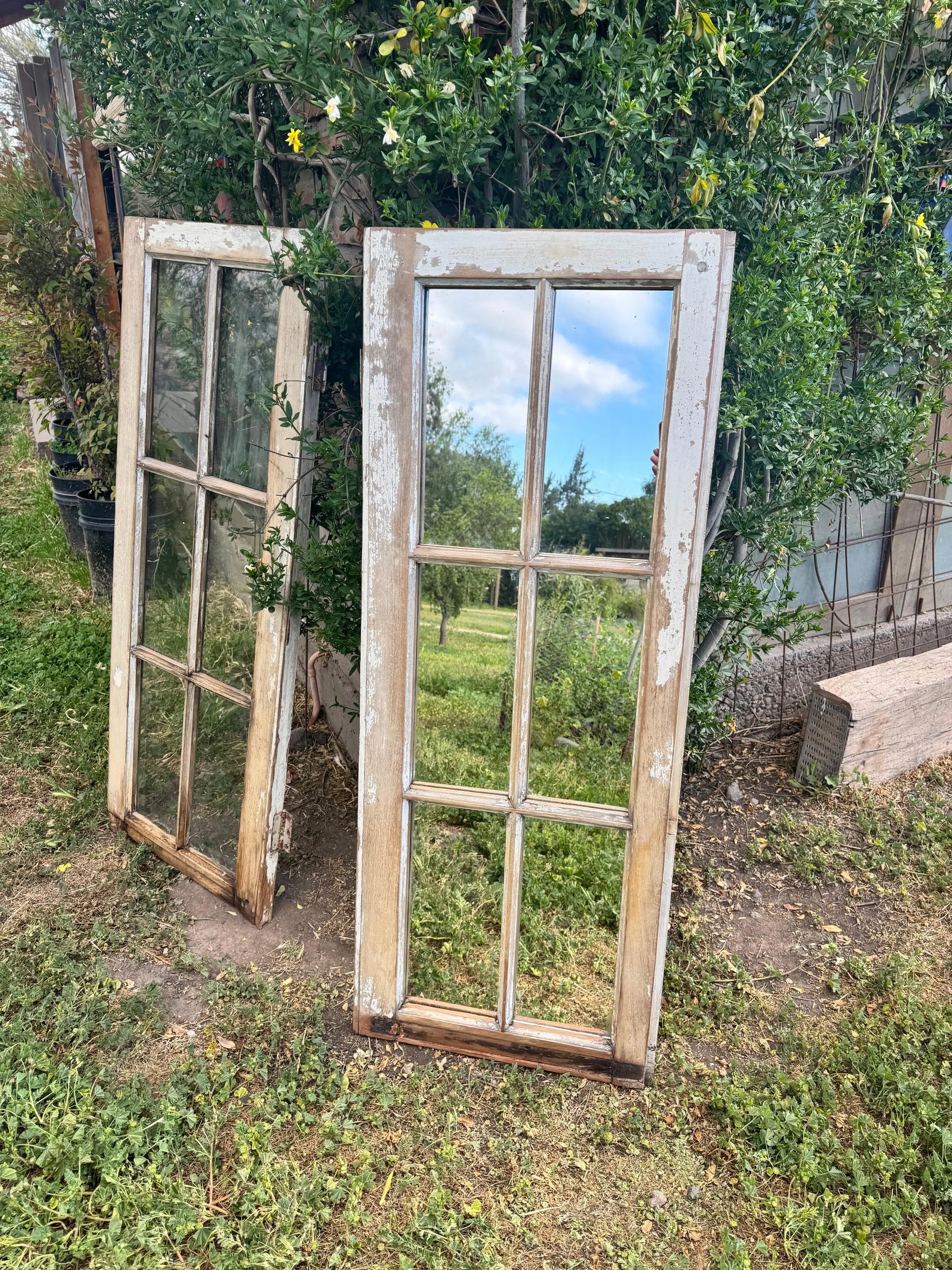 Espejo_de_ventana_y_ventana_atras