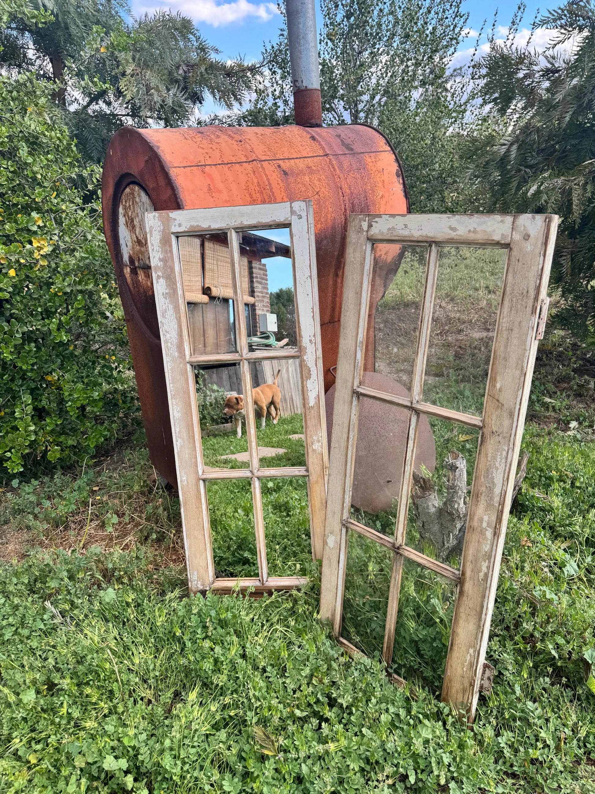 Espejo_de_ventana_y_ventana_sobre_horno_de_barro