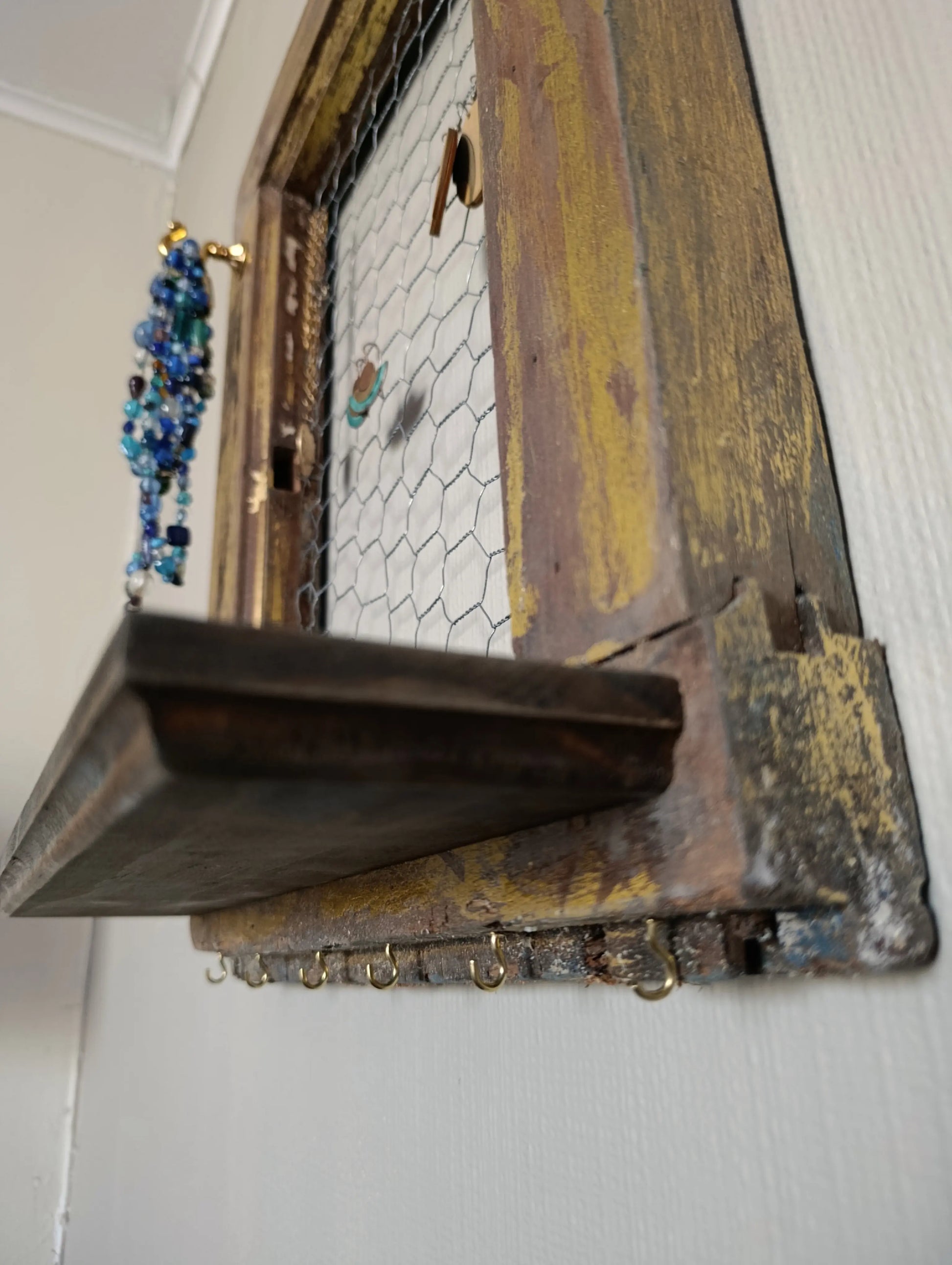 Repisa_aros_y_accesorios_perchitas_diagonal_abajo